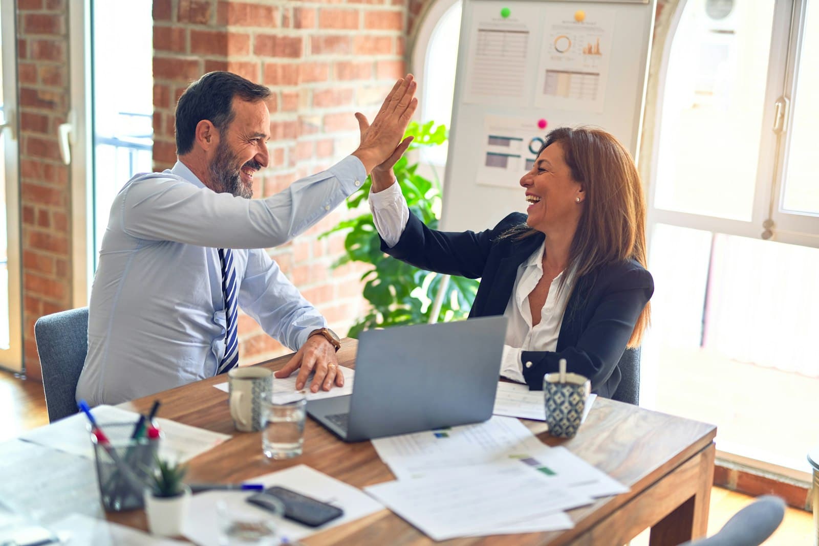 VijayaRaj advisors working with a client