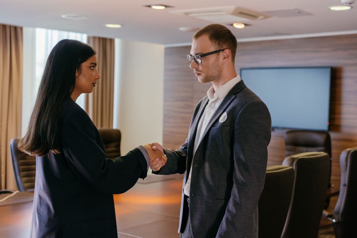 A handshake closing a successful engagement